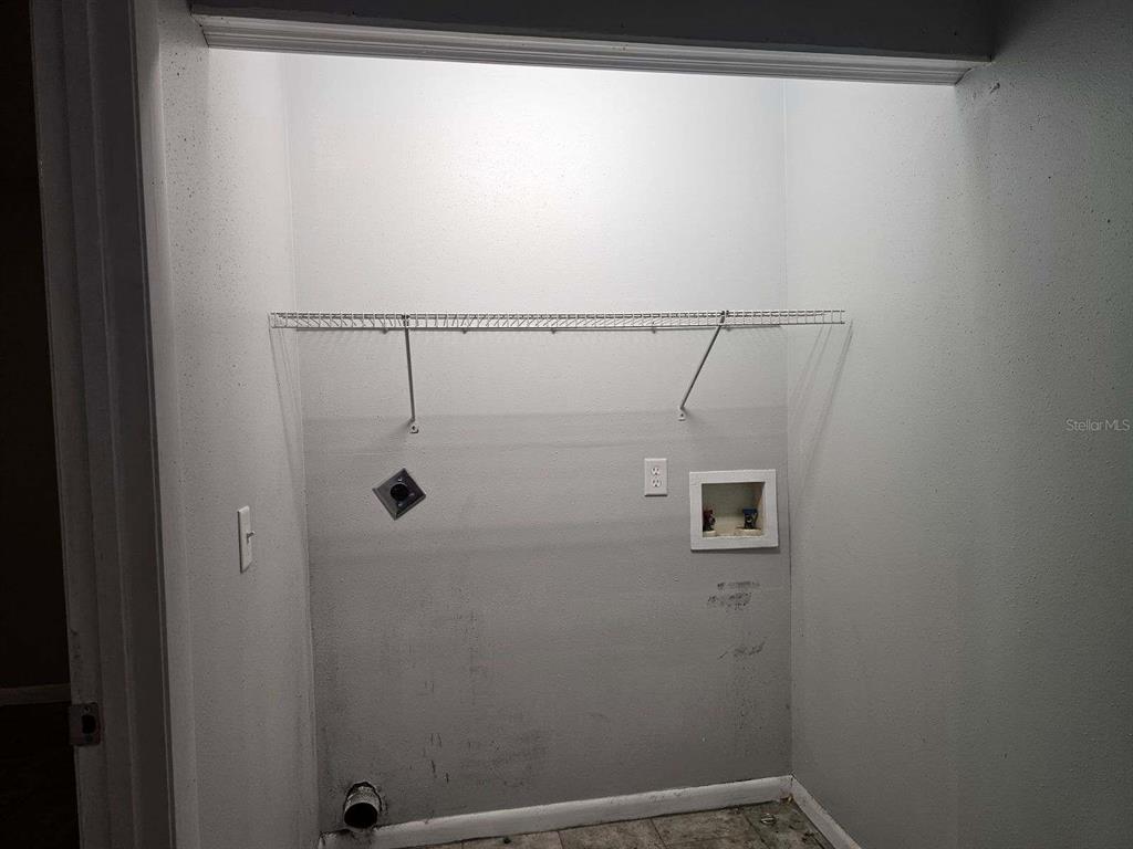 112 Jasper Street Bushnell, FL 33513 - Photo 11 of 12 a bathroom with a shower