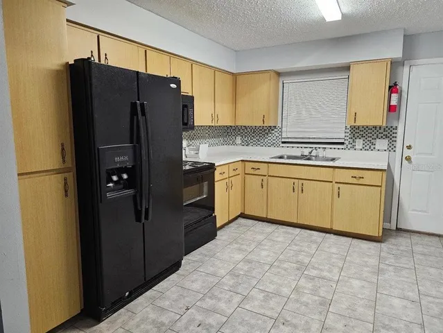 a bathroom with a toilet sink and bathtub