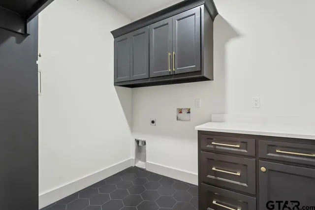 a view of cabinets and wooden floor