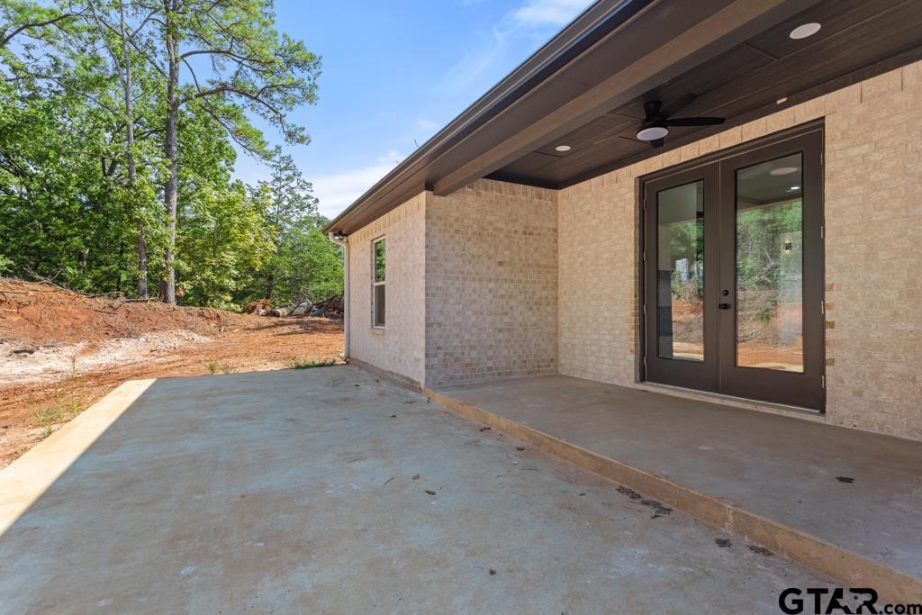 15837 Stillwaters Lindale, TX 75771 - Photo 26 of 34 a view of a house with backyard and garden
