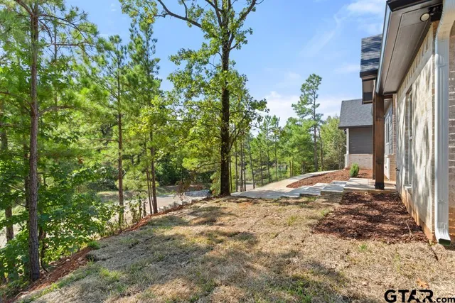 a house view with a outdoor space