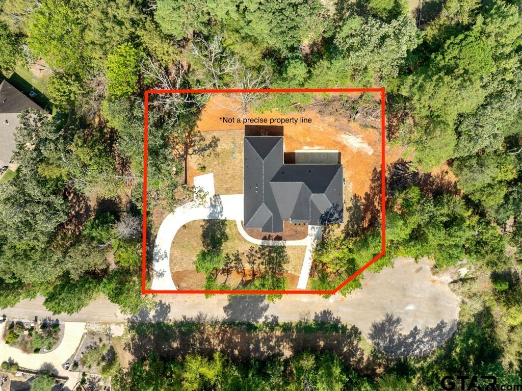 15837 Stillwaters Lindale, TX 75771 - Photo 31 of 34 an aerial view of a house with a yard and garden