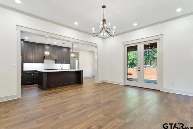 a view of a kitchen with a sink and dishwasher