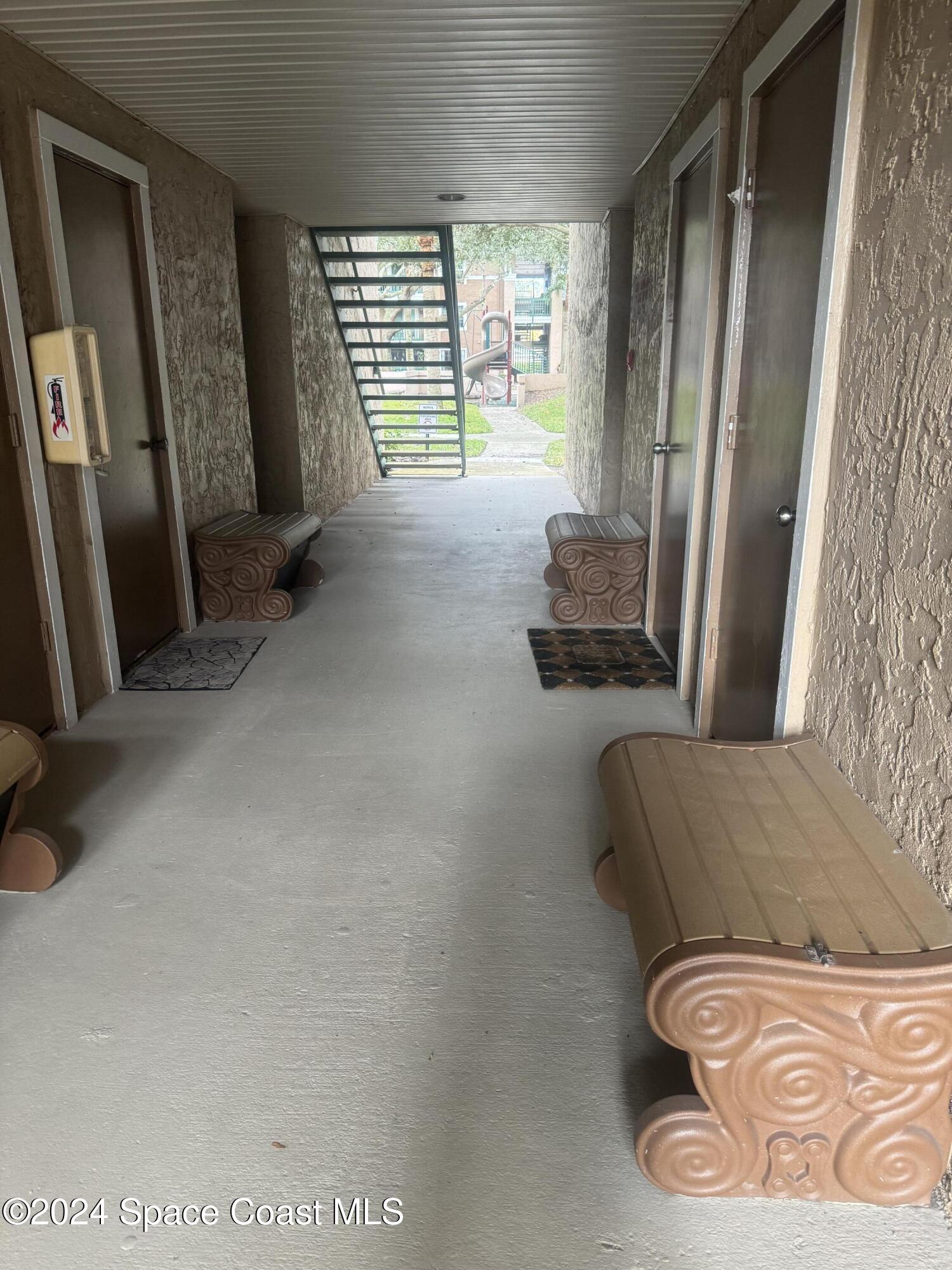 7667 North Wickham Road, Unit 1203 Melbourne, FL 32940 - Photo 15 of 21 Breezway with storage closet