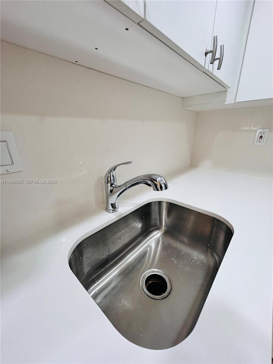 8603 Southwest 68th Court, Unit 22 Miami, FL 33156 - Photo 13 of 49 a close view of sink