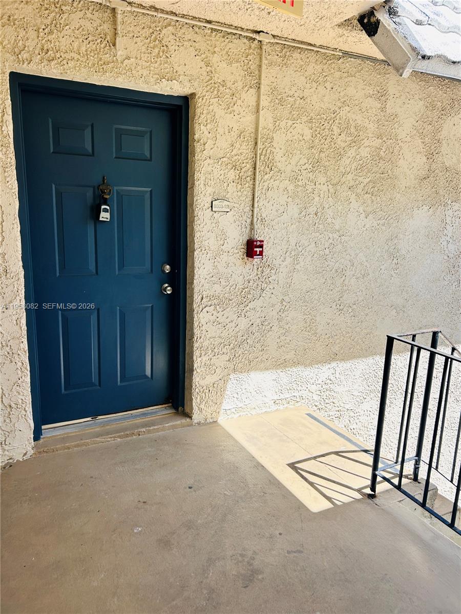 8603 Southwest 68th Court, Unit 22 Miami, FL 33156 - Photo 23 of 49 a view of an empty room