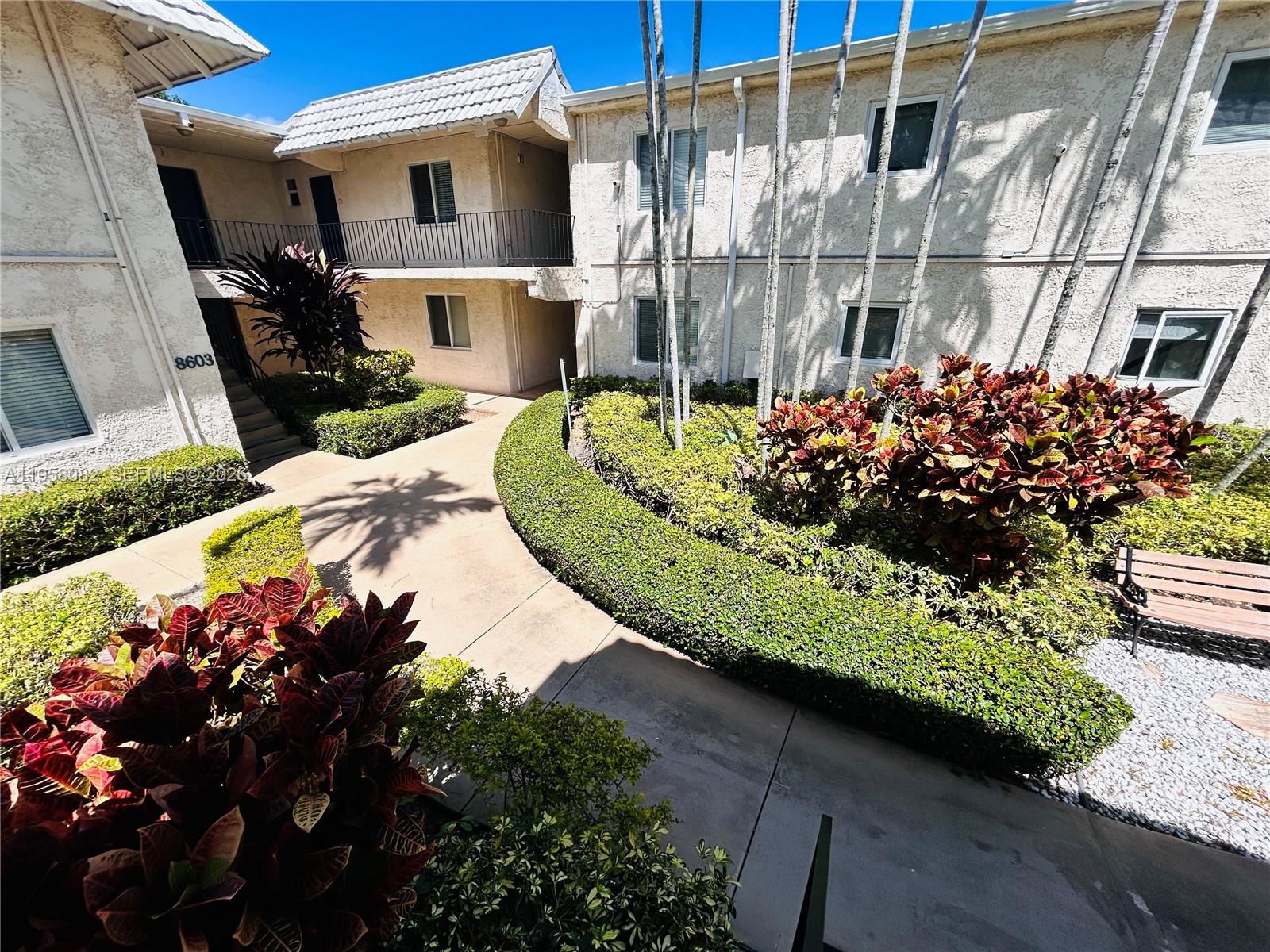 8603 Southwest 68th Court, Unit 22 Miami, FL 33156 - Photo 29 of 49 a view of an outdoor space