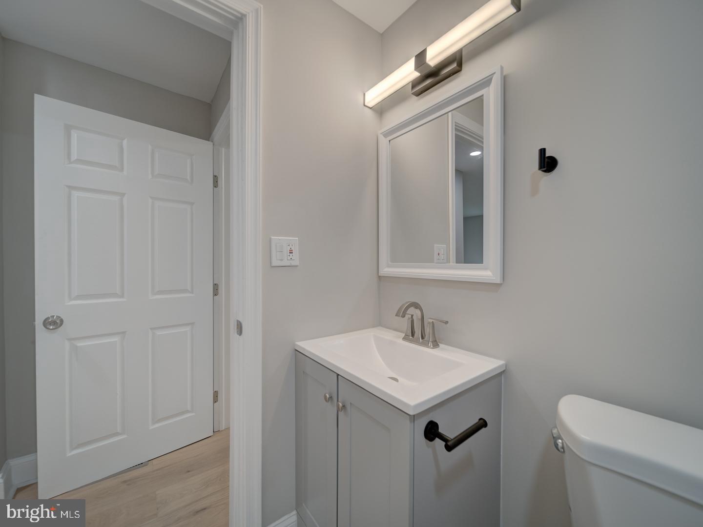 842 South Stepney Road Aberdeen, MD 21001 - Photo 27 of 50 a bathroom with a sink a toilet and a mirror