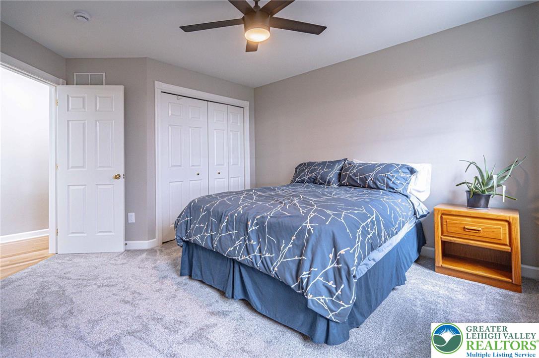 6551 Overlook Road Orefield, PA 18069 - Photo 51 of 82 a bedroom with a bed and a window