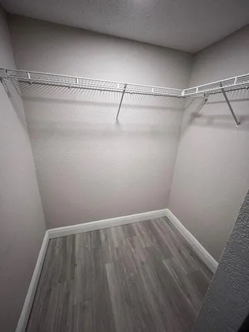 a view of a room with racks on the wall