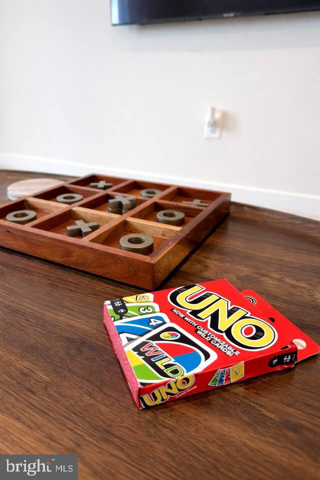 5611 Alpha Ridge Avenue Hyattsville, MD 20782 - Photo 12 of 18 a view of a room with wooden floor and pool table