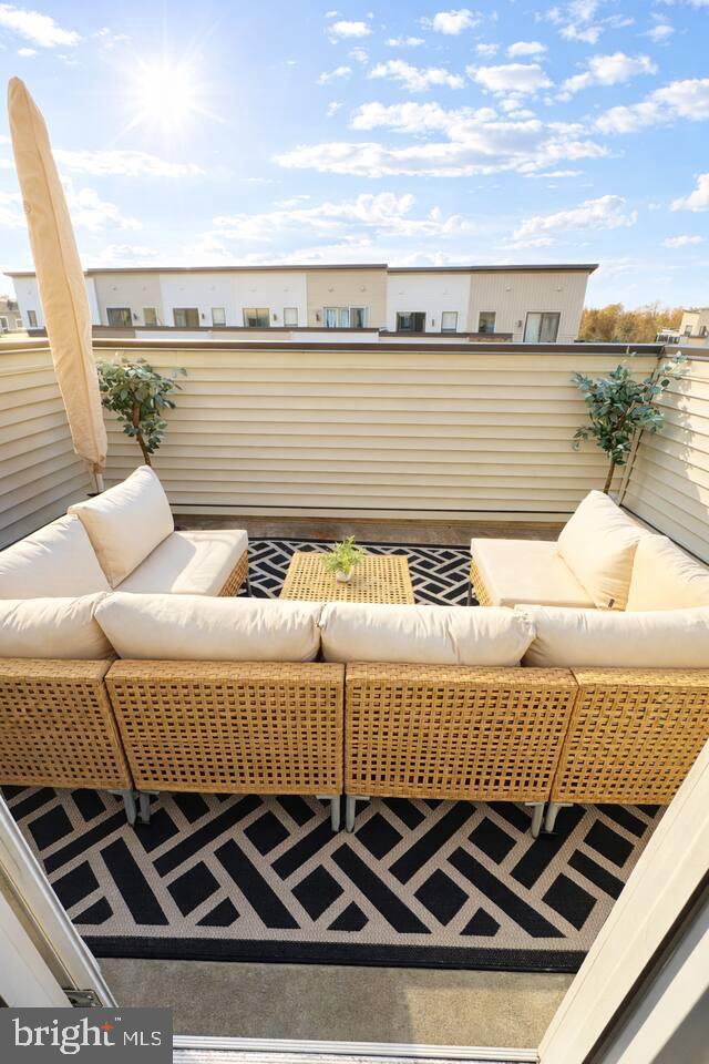 5611 Alpha Ridge Avenue Hyattsville, MD 20782 - Photo 18 of 18 a view of a roof deck with patio
