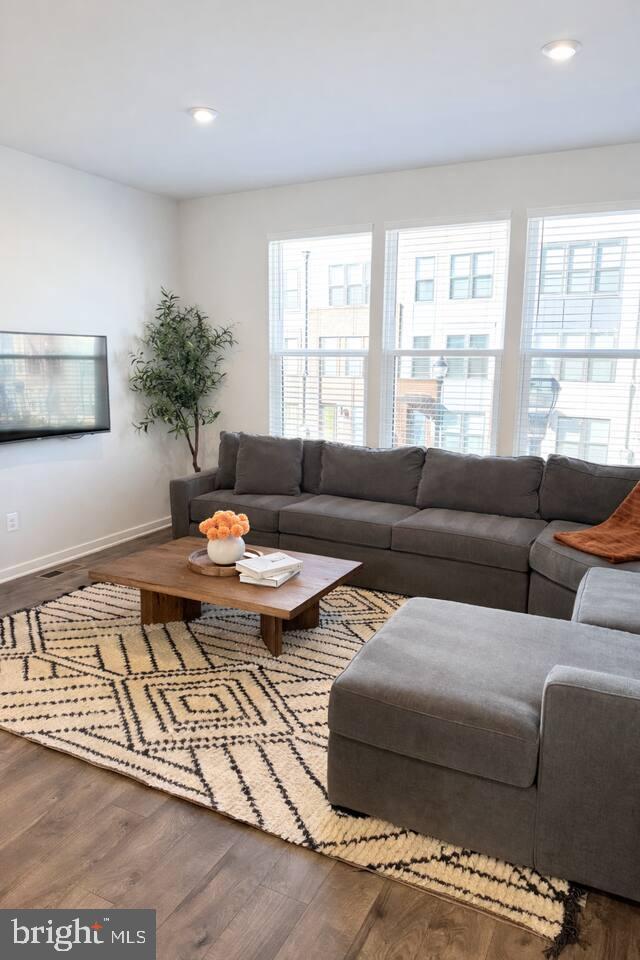 5611 Alpha Ridge Avenue Hyattsville, MD 20782 - Photo 5 of 18 a living room with furniture and a large window