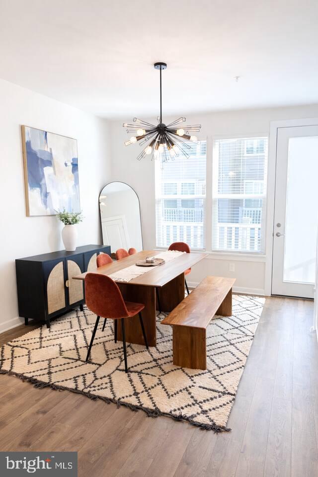 5611 Alpha Ridge Avenue Hyattsville, MD 20782 - Photo 8 of 18 a living room with furniture a table and a large window