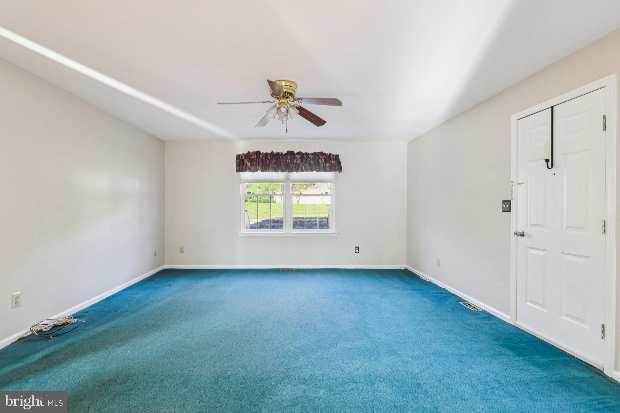 22 Hawk Lane Marlton, NJ 08053 - Photo 11 of 46 an empty room with windows and fan
