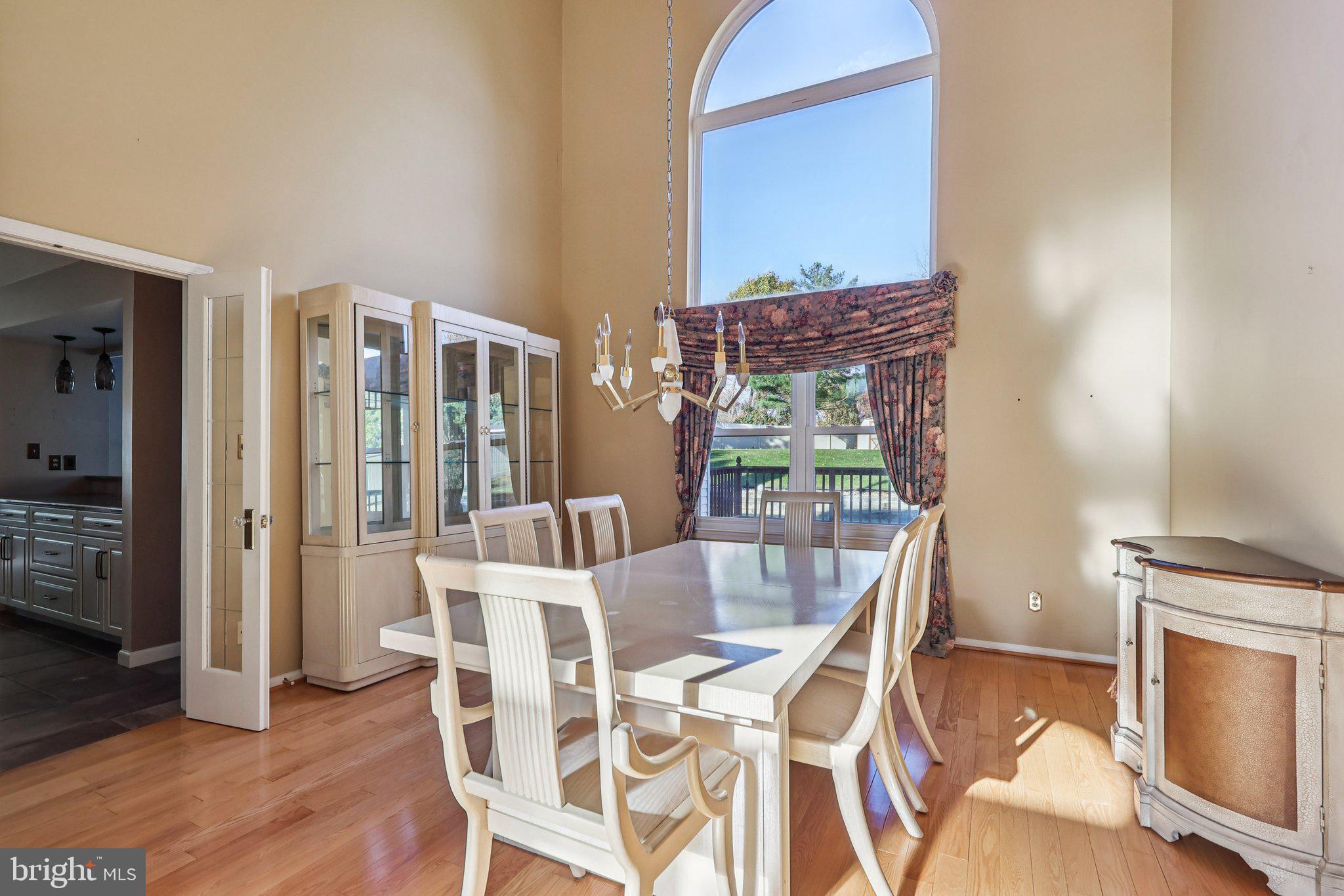 22 Hawk Lane Marlton, NJ 08053 - Photo 18 of 46 a view of a dining room with furniture window and wooden floor