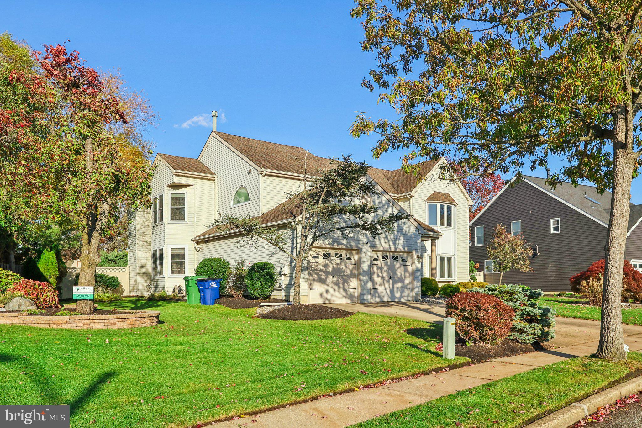 22 Hawk Lane Marlton, NJ 08053 - Photo 2 of 46 a front view of a house with garden
