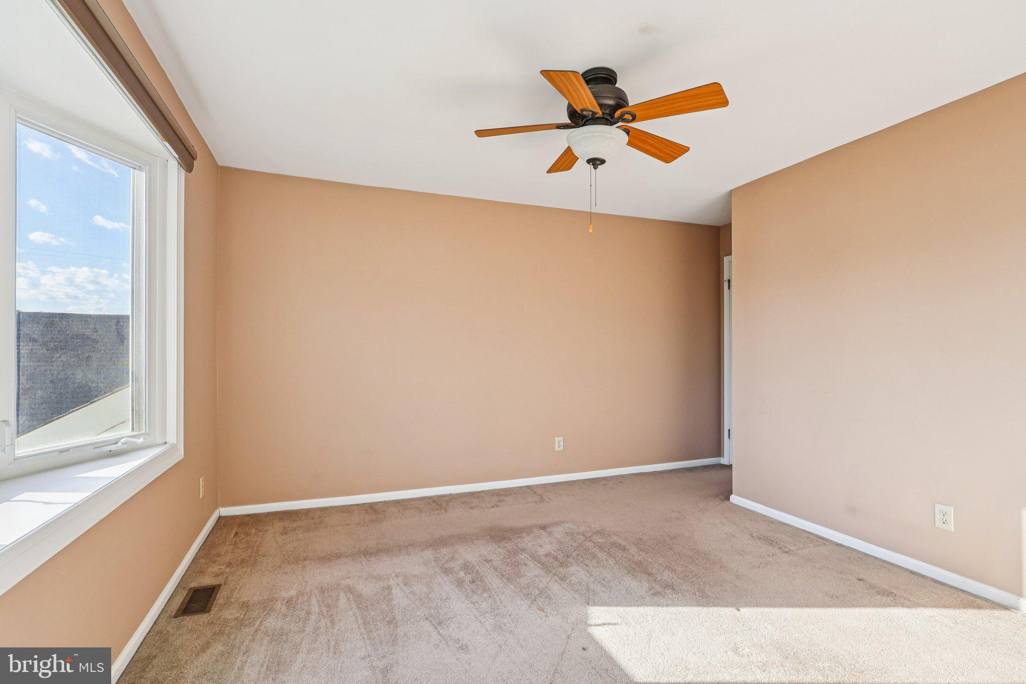 22 Hawk Lane Marlton, NJ 08053 - Photo 29 of 46 a view of empty room with wooden floor and fan