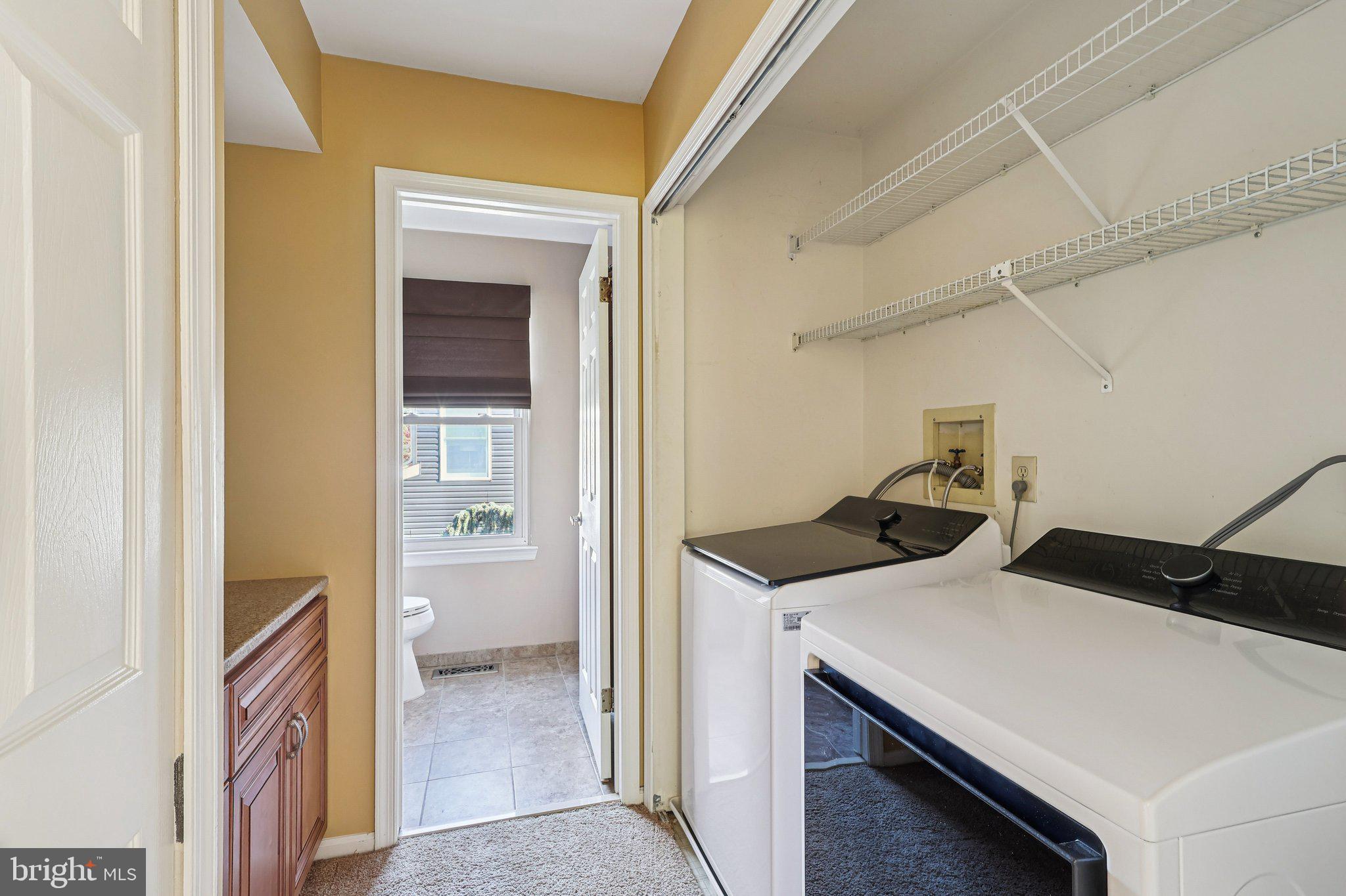 22 Hawk Lane Marlton, NJ 08053 - Photo 30 of 46 a utility room with dryer and washer