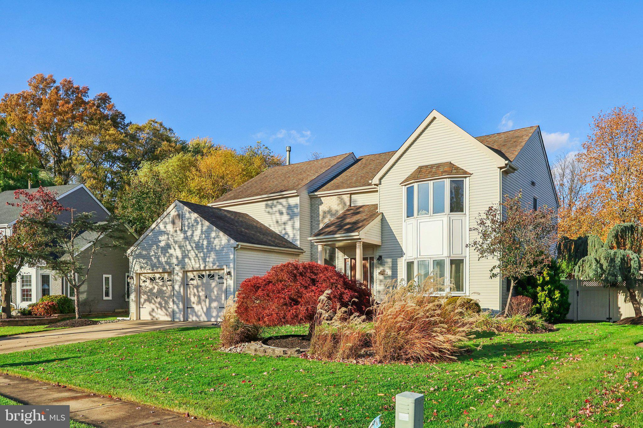 22 Hawk Lane Marlton, NJ 08053 - Photo 3 of 46 a front view of a house with a yard