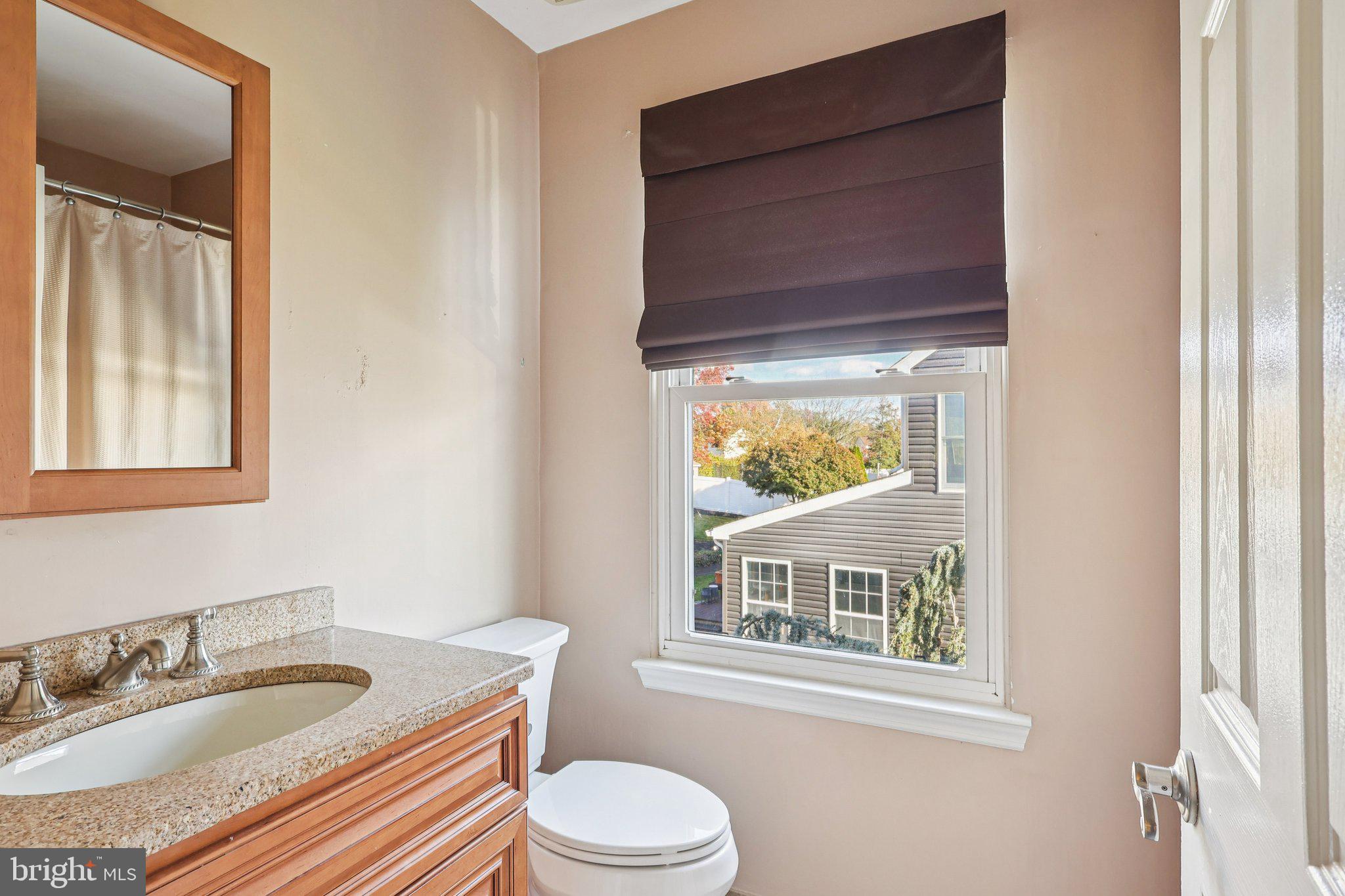 22 Hawk Lane Marlton, NJ 08053 - Photo 31 of 46 a bathroom with a granite countertop toilet sink and mirror
