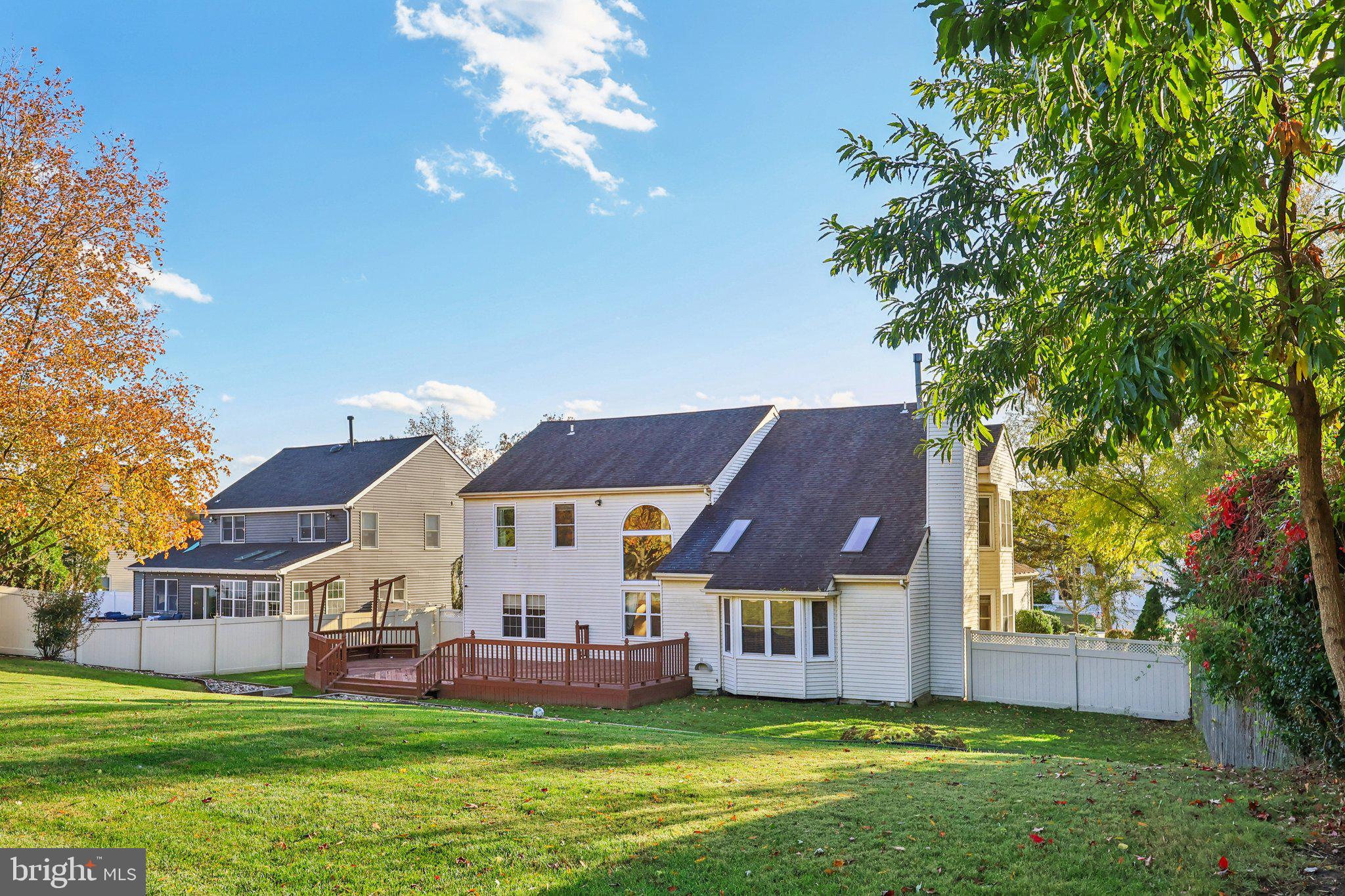 22 Hawk Lane Marlton, NJ 08053 - Photo 43 of 46 a view of a house with a big yard and large trees