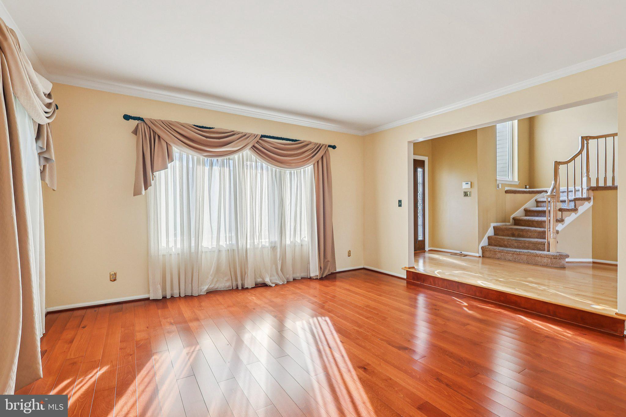 22 Hawk Lane Marlton, NJ 08053 - Photo 8 of 46 a view of a room with wooden floor and stairs