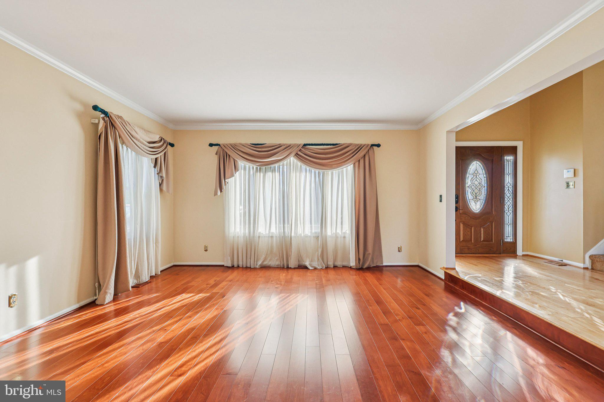 22 Hawk Lane Marlton, NJ 08053 - Photo 9 of 46 a view of empty room with wooden floor and fan