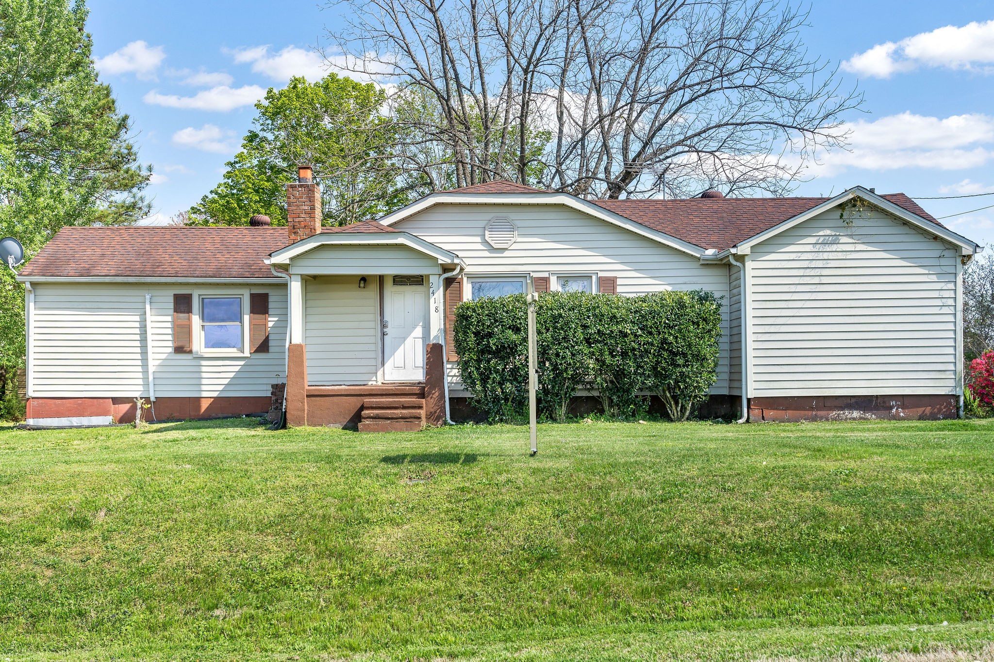 2418 Lock B Road North Clarksville, TN 37043 - Photo 2 of 30 a view of a house with a yard and sitting area