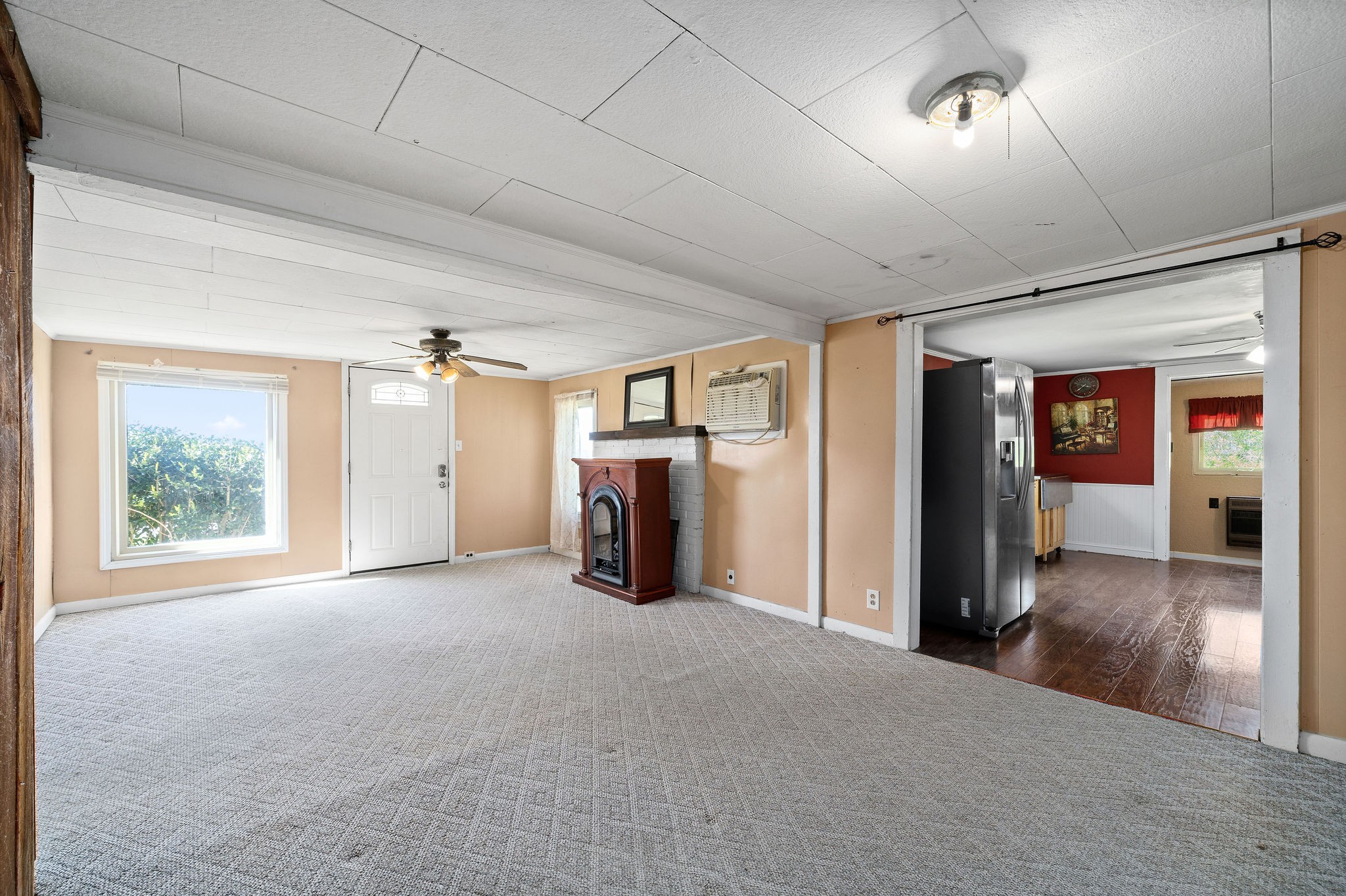 2418 Lock B Road North Clarksville, TN 37043 - Photo 12 of 30 en empty room with wooden floor and windows