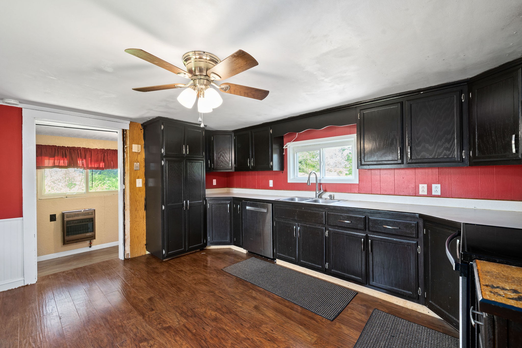 2418 Lock B Road North Clarksville, TN 37043 - Photo 13 of 30 a kitchen with stainless steel appliances granite countertop a sink dishwasher a stove and a refrigerator with wooden floor
