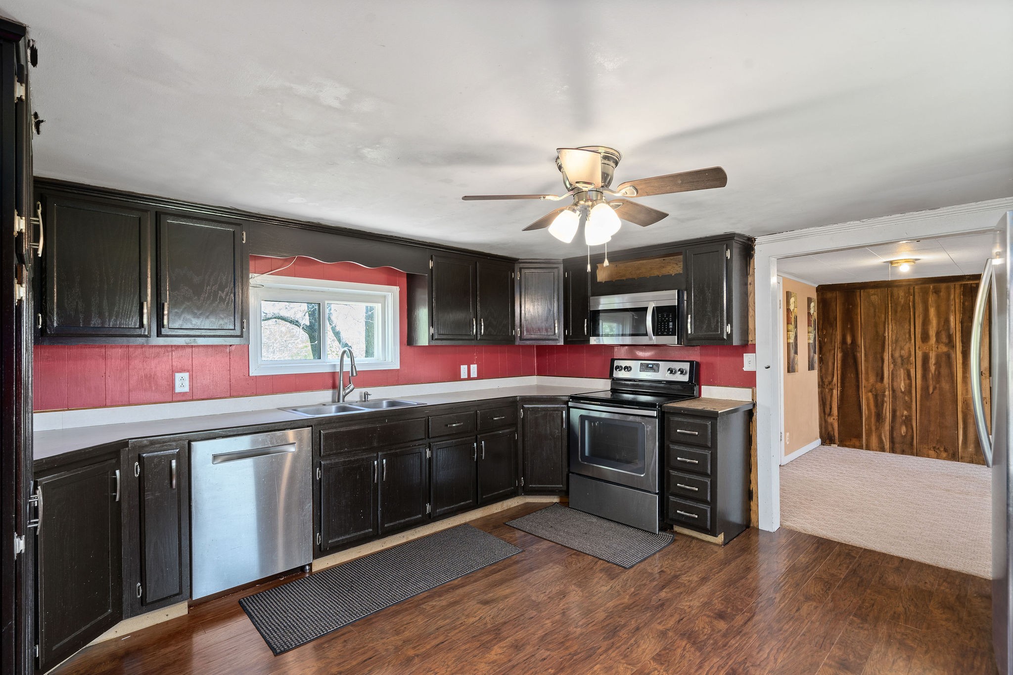 2418 Lock B Road North Clarksville, TN 37043 - Photo 14 of 30 a kitchen with stainless steel appliances granite countertop a sink and a stove