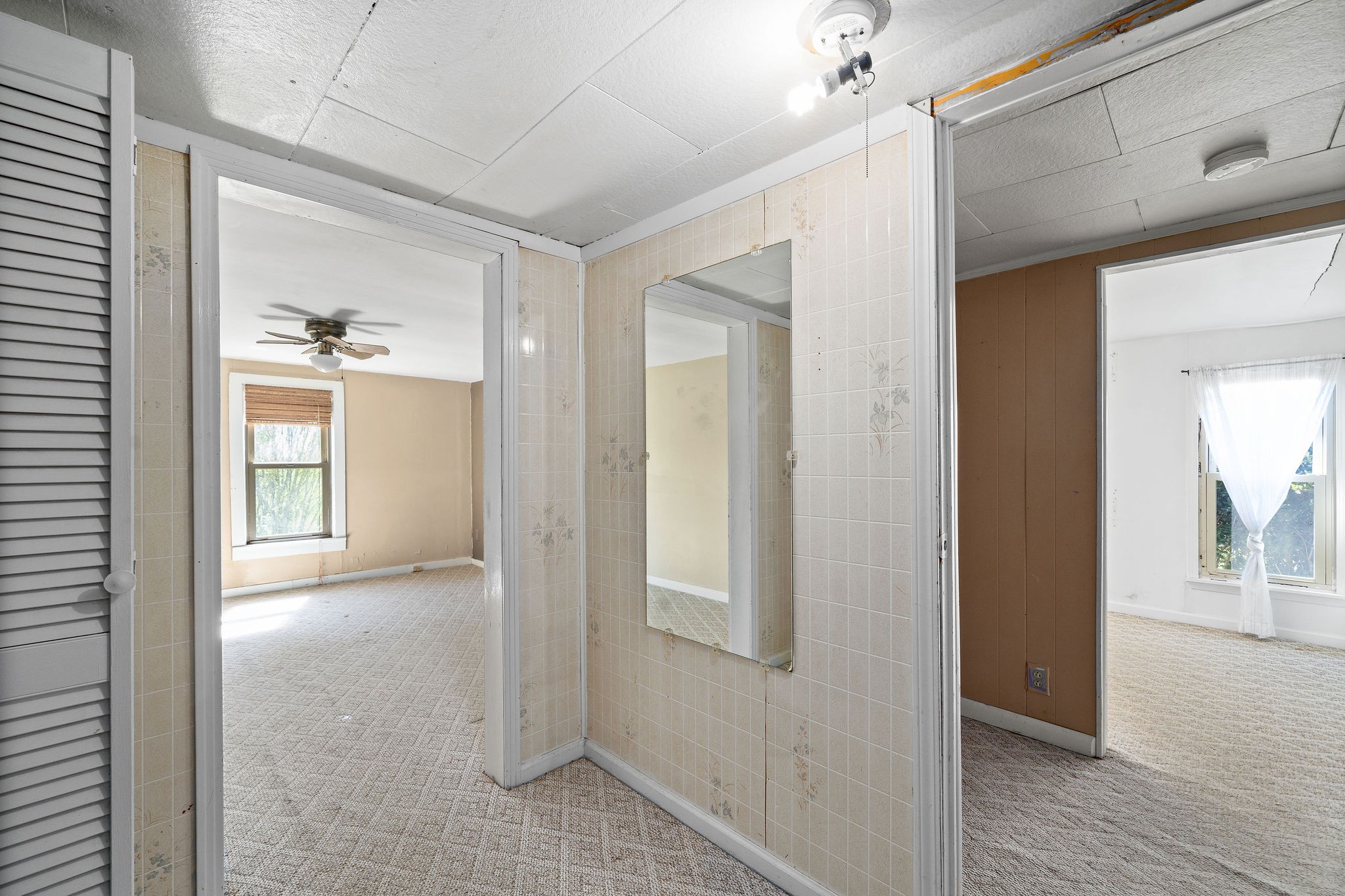 2418 Lock B Road North Clarksville, TN 37043 - Photo 23 of 30 a view of a hallway with wooden floor and a cabinet
