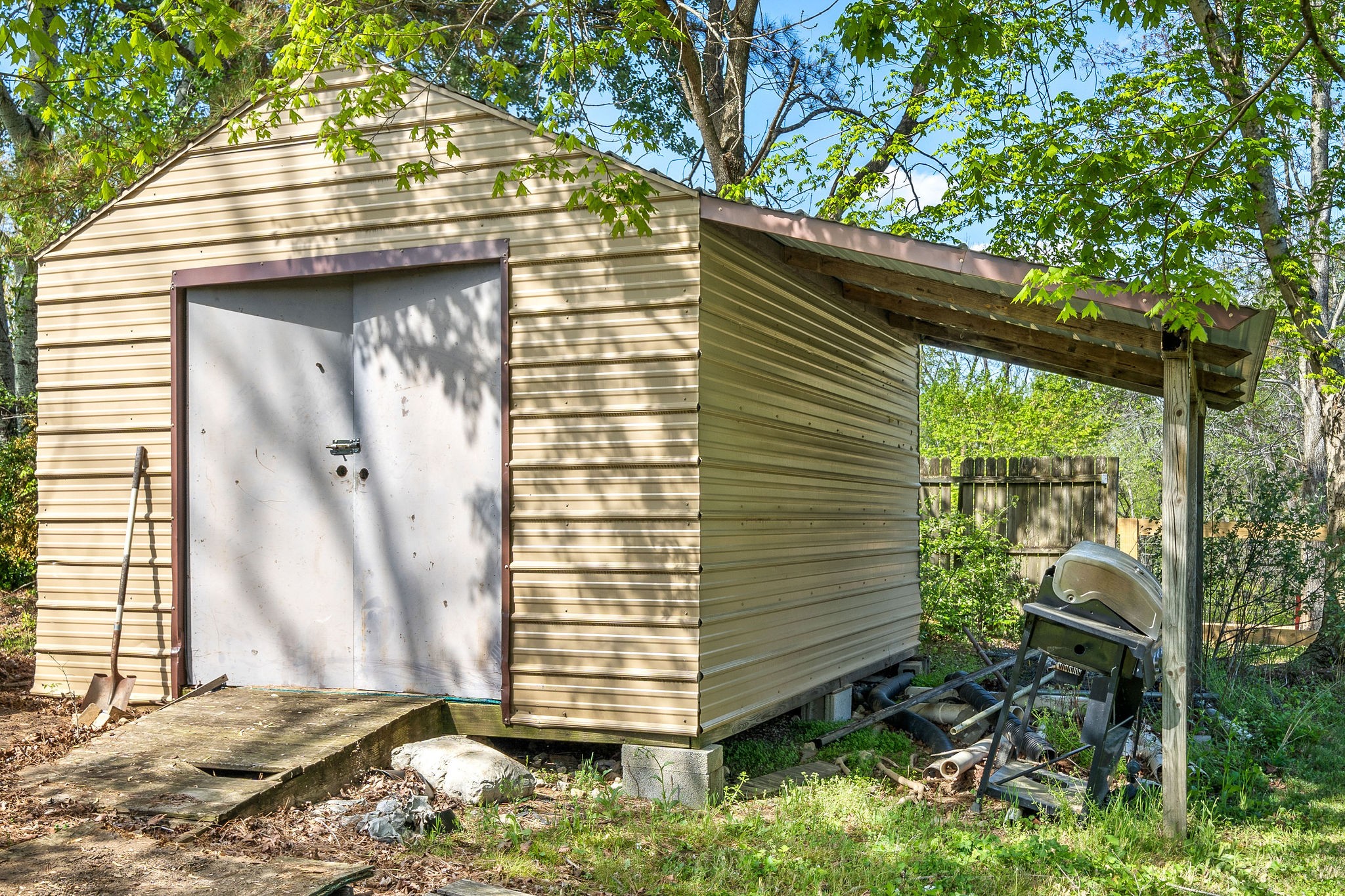 2418 Lock B Road North Clarksville, TN 37043 - Photo 28 of 30 a view of small house with a door back yard