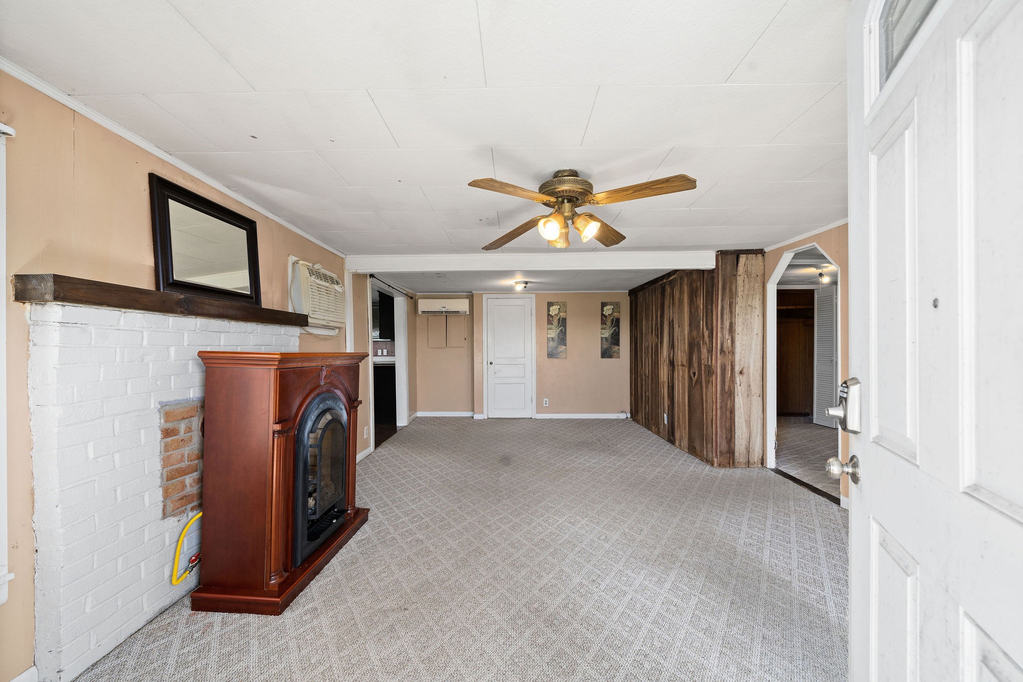 2418 Lock B Road North Clarksville, TN 37043 - Photo 5 of 30 a view of a livingroom with a fireplace and a window