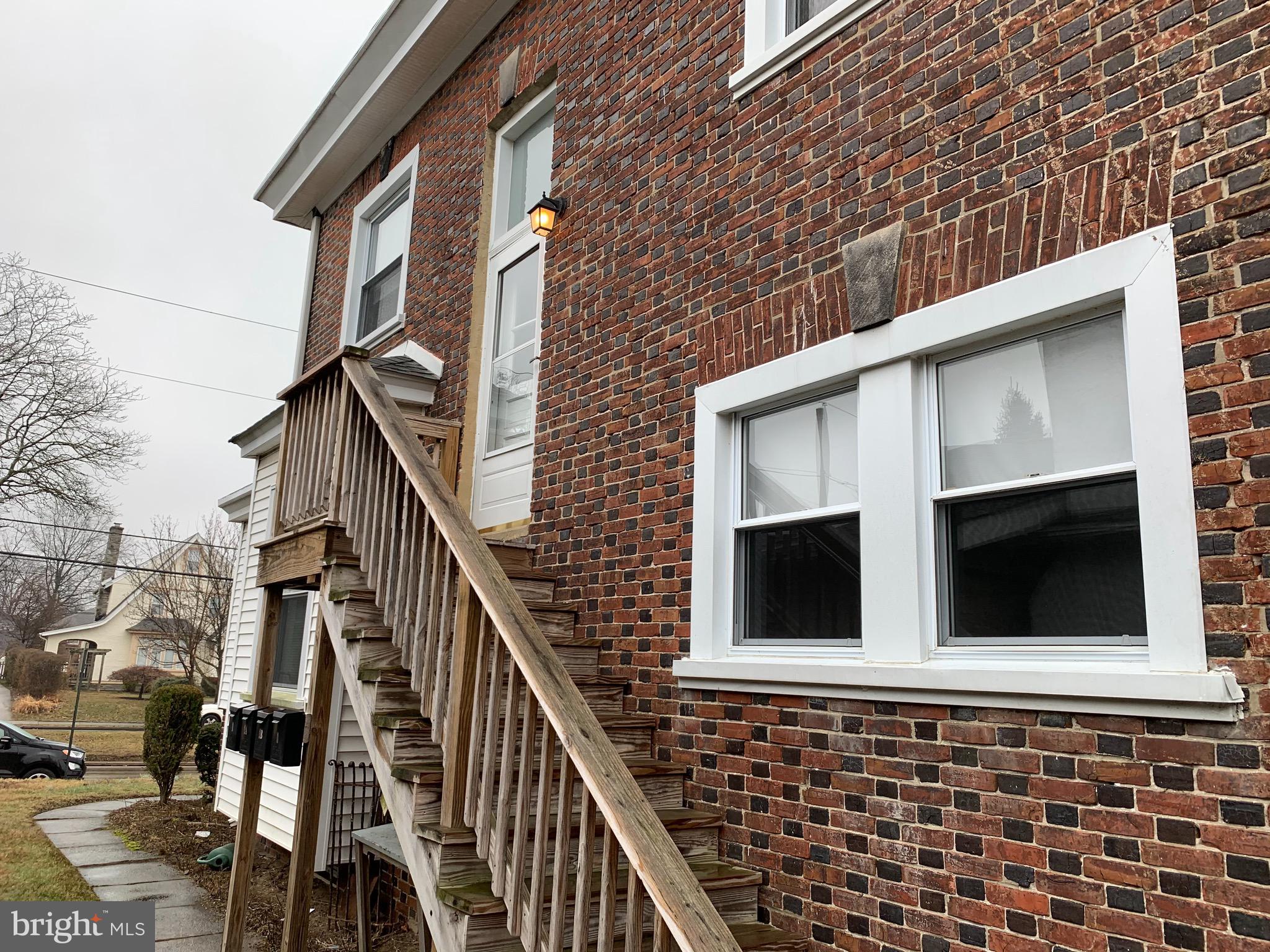 a brick house with front door