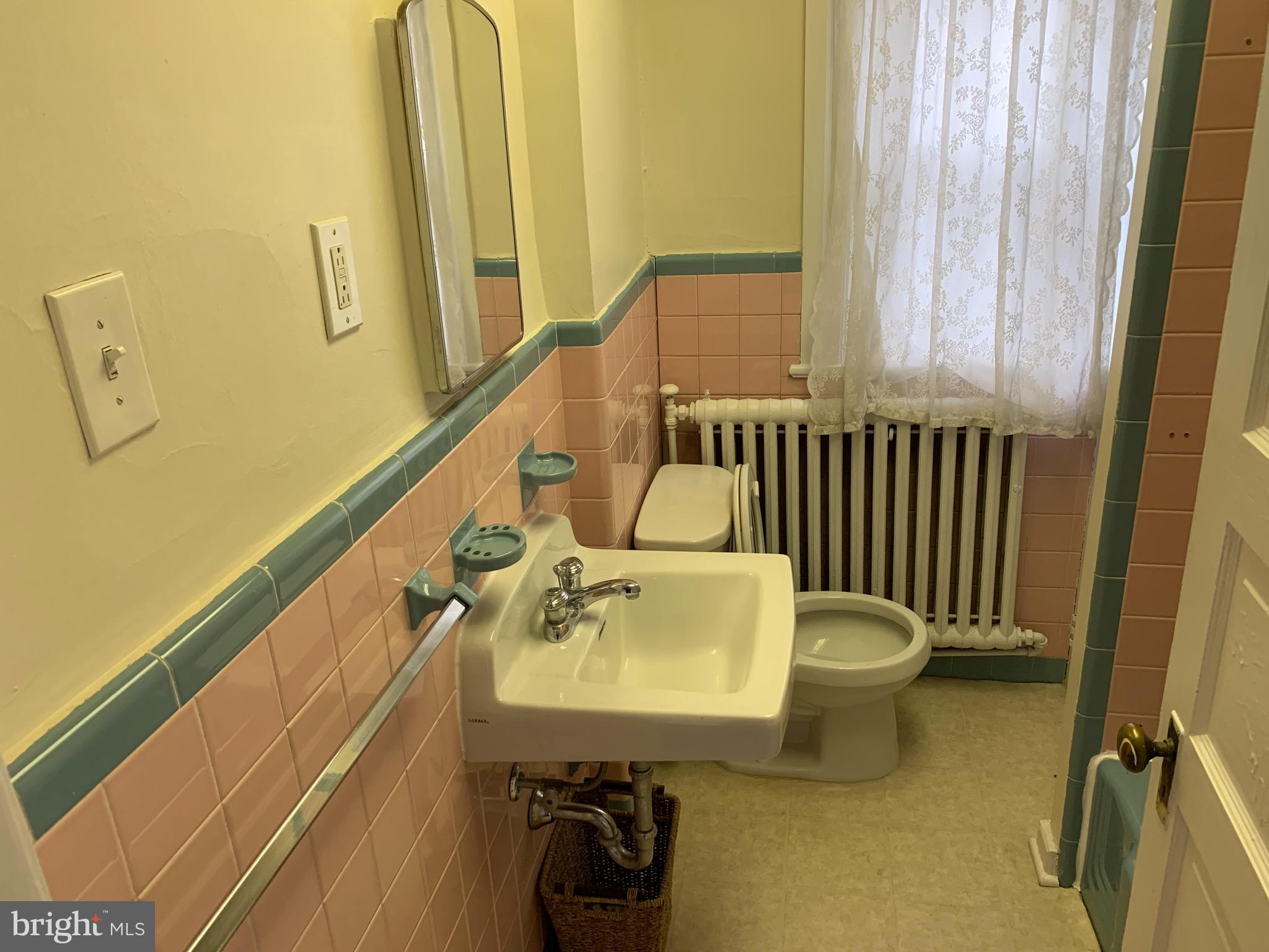 800 Darby Road, Unit 2A Havertown, PA 19083 - Photo 6 of 8 a bathroom with a sink and mirror