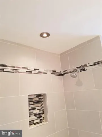 a view of a air conditioner in a bathroom