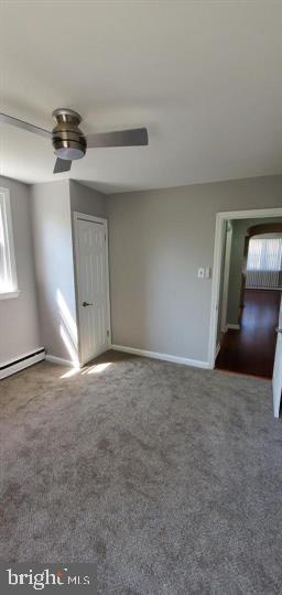 6321 East Fariston Drive Philadelphia, PA 19120 - Photo 10 of 31 en empty room with windows and ceiling fan
