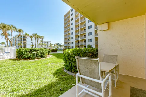 a view of balcony with outdoor seating and plants