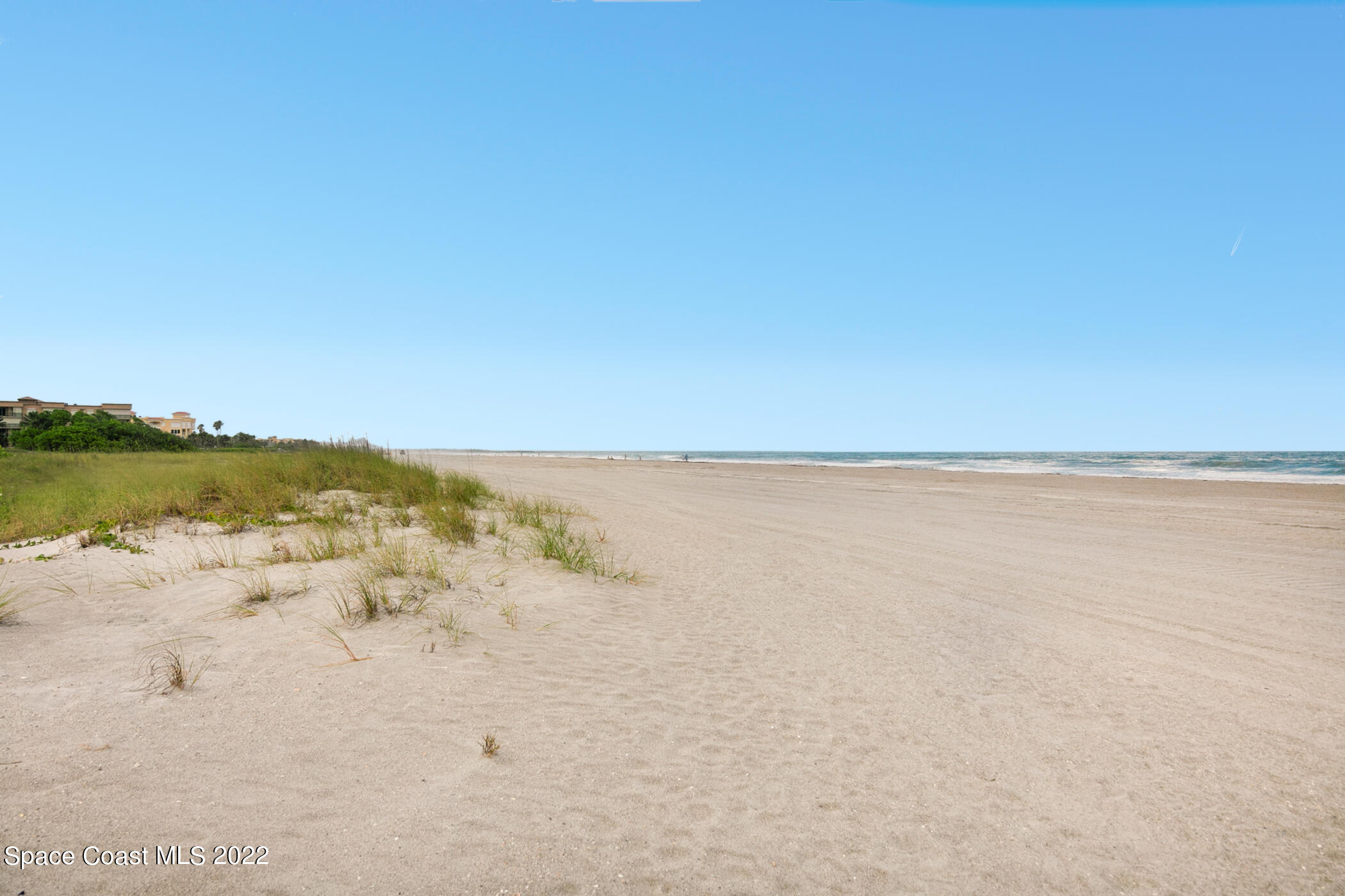 7520 Ridgewood Avenue, Unit 104 Cape Canaveral, FL 32920 - Photo 24 of 35 a view of an ocean beach