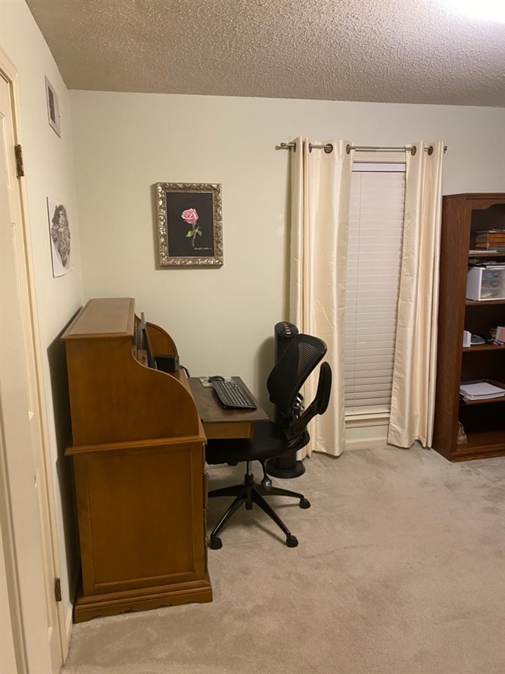 100 Ericson Road Memphis, TN 38018 - Photo 18 of 24 AGAIN, THESE SECONDARY BEDROOMS ARE SO ROOM. THIS ONE IS BEING USED AS A DOUBLE OFFICE.