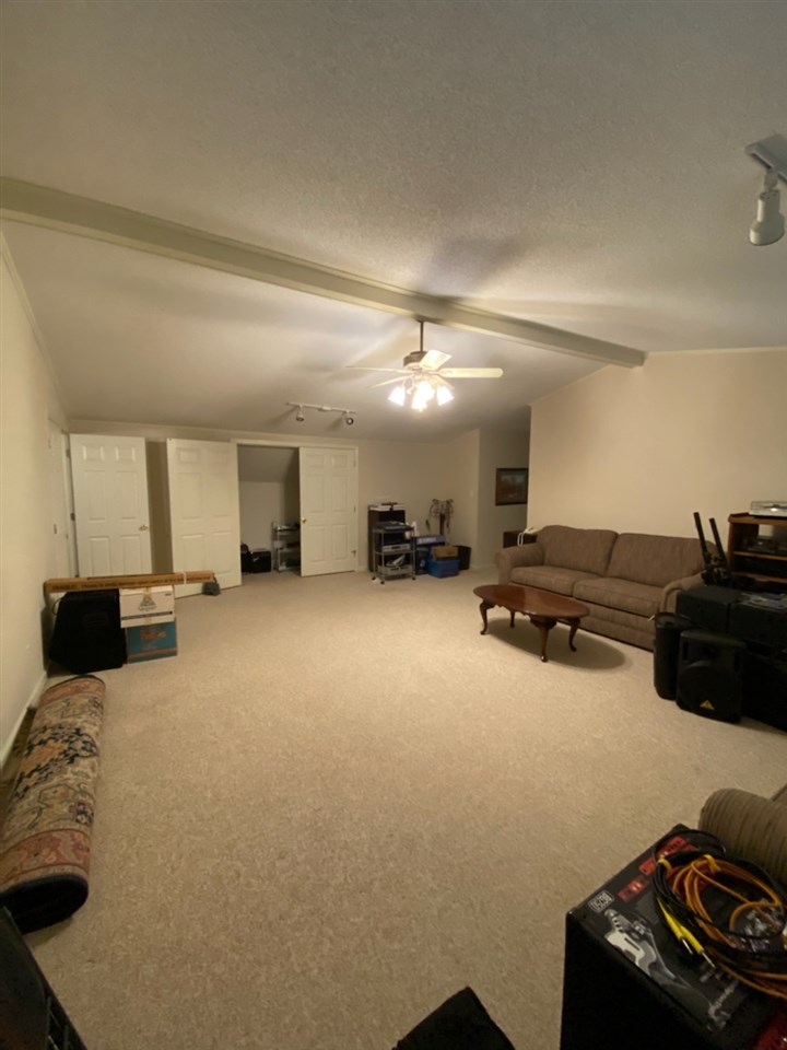 100 Ericson Road Memphis, TN 38018 - Photo 21 of 24 AT THE TOP OF THE STAIRS YOU WILL FIND THIS AMAZING MULTI-PURPOSE ROOM. The sky is the limit on all of the things you can do with this room. Currently used as a Music Room/Studio, it could also be a Movie Theater, a Kid's Game Room, or Man Cave.