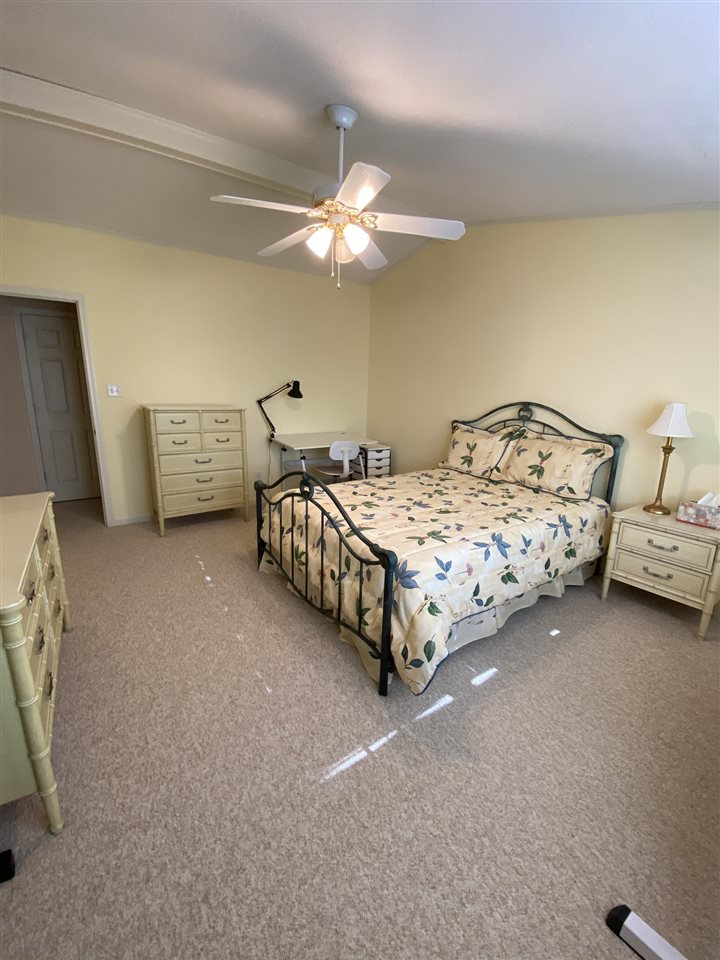 100 Ericson Road Memphis, TN 38018 - Photo 22 of 24 This is the upstairs bedroom. also very roomy, fresh, and sunny with plenty of privacy, and sits right next to the full upstairs bathroom. and across the hall there are two huge storage closets.