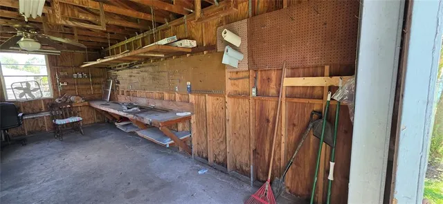 an aerial view of a house with outdoor space