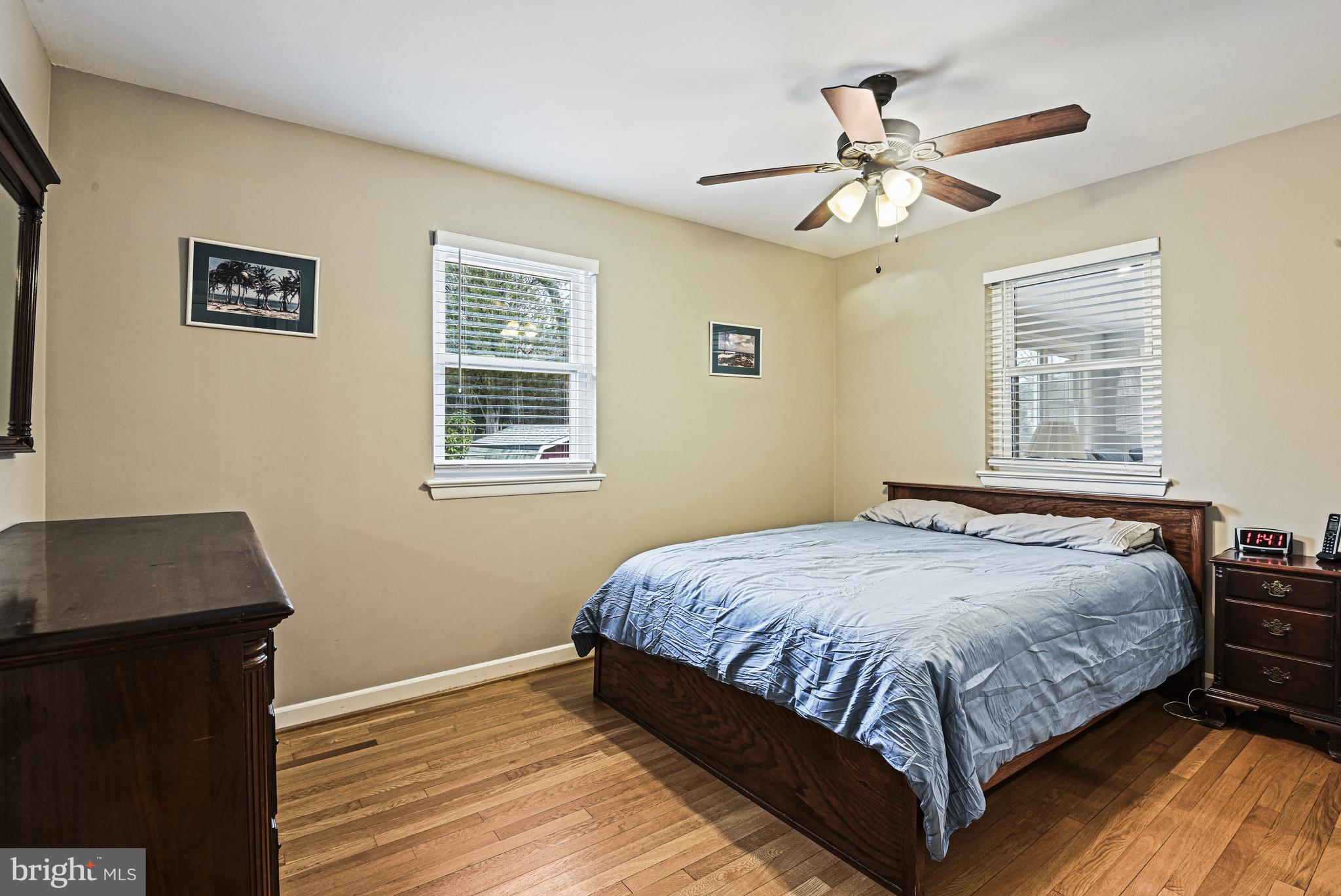 1905 Lamson Place McLean, VA 22101 - Photo 11 of 31 a bedroom with a bed and wooden floor