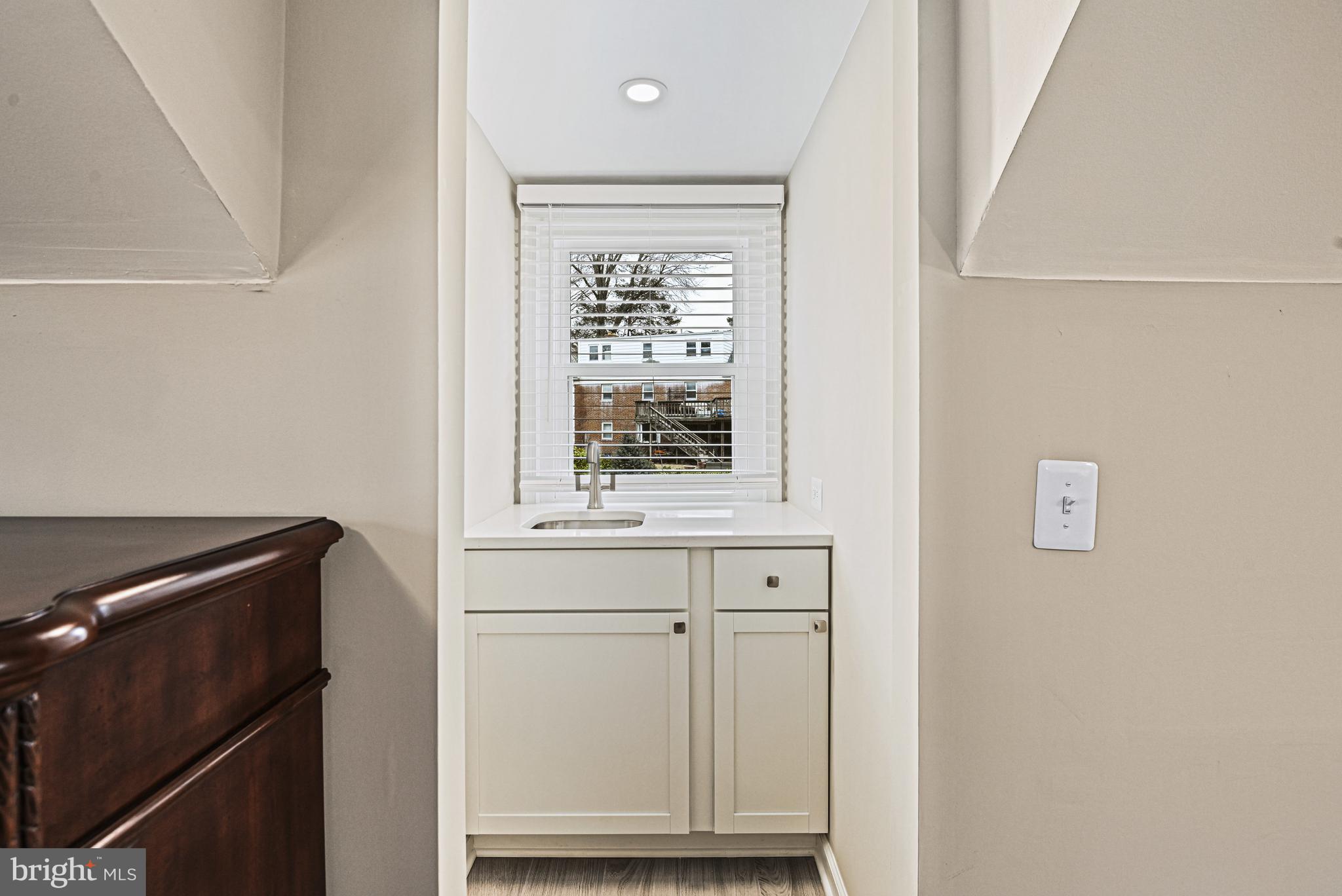 1905 Lamson Place McLean, VA 22101 - Photo 15 of 31 a view of cabinets and window