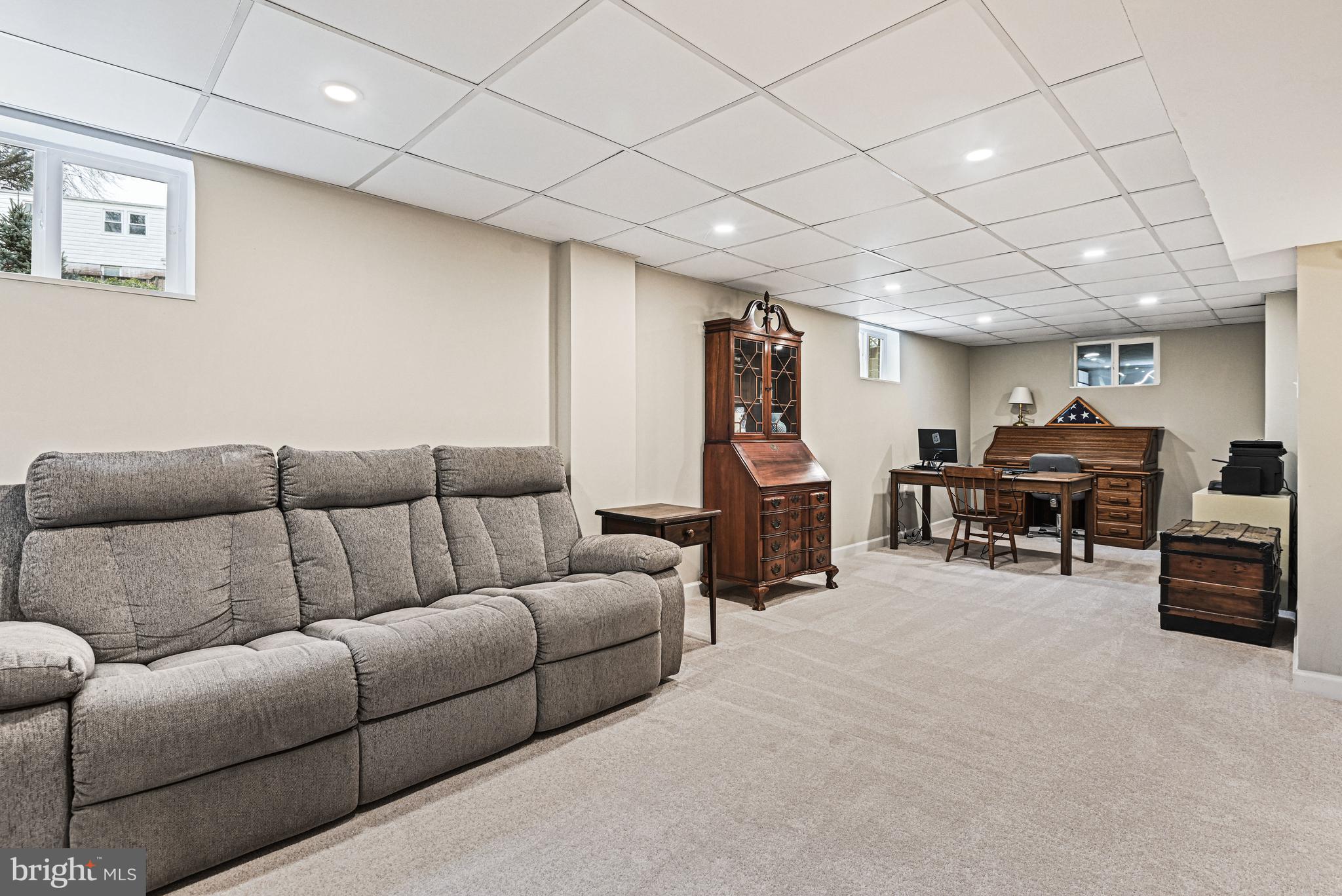 1905 Lamson Place McLean, VA 22101 - Photo 19 of 31 a living room with furniture and a flat screen tv