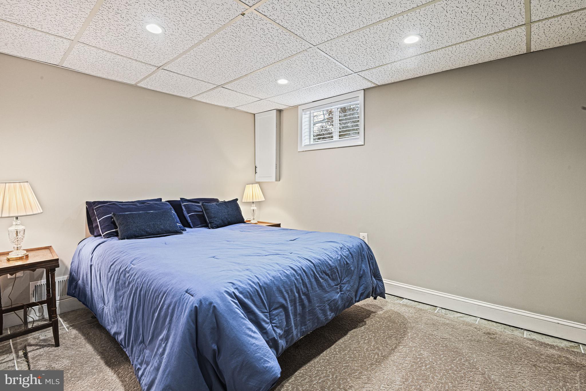 1905 Lamson Place McLean, VA 22101 - Photo 20 of 31 a bedroom with a bed and a night stand