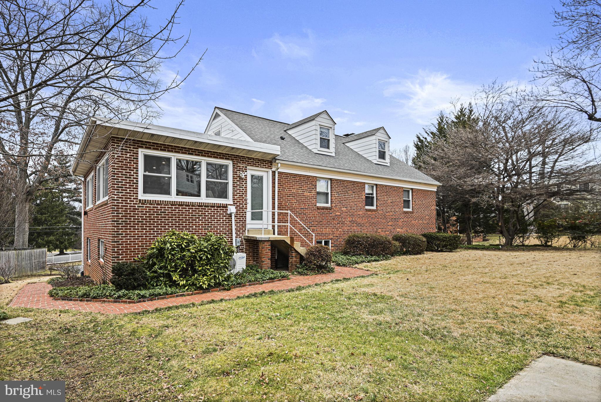 1905 Lamson Place McLean, VA 22101 - Photo 24 of 31 a front view of a house with a yard